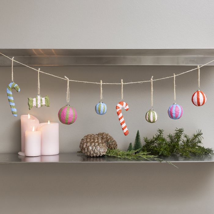 Colourful Christmas decorations made from papier-mâché pulp