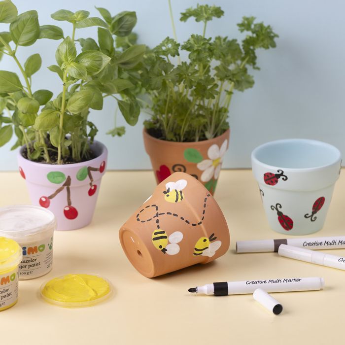 Personal herb pots with fingerprints