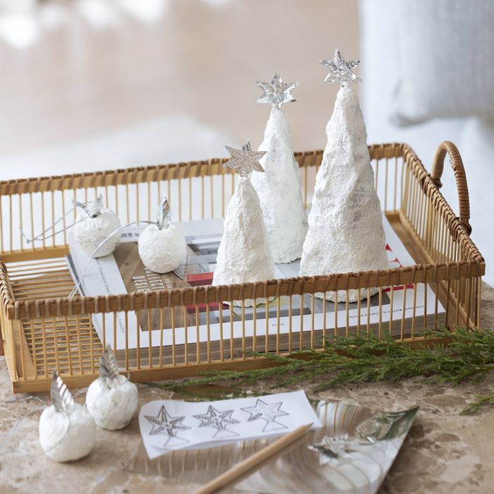 Christmas trees and apples with pulp and silver decorations