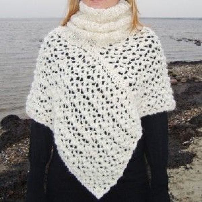 A short Poncho with a Roll Neck