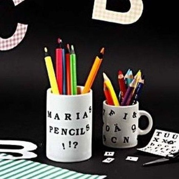 A Porcelain Mug with Color Dekor Letters