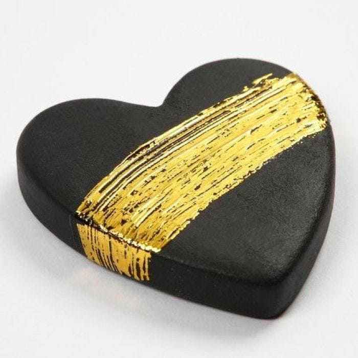 A Terracotta Heart with Gold Art and Craft Foil