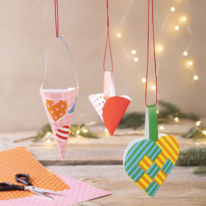 A Woven Heart Basket and a Cone made from Glazed Paper