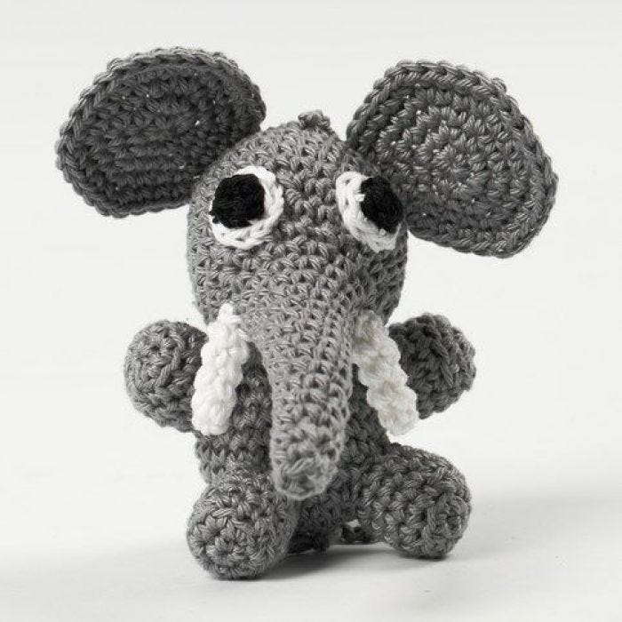 A crocheted sitting Elephant