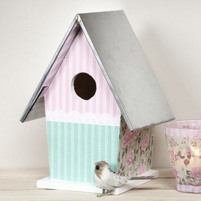 A painted and decoupaged wooden Bird Box with a Zinc Roof