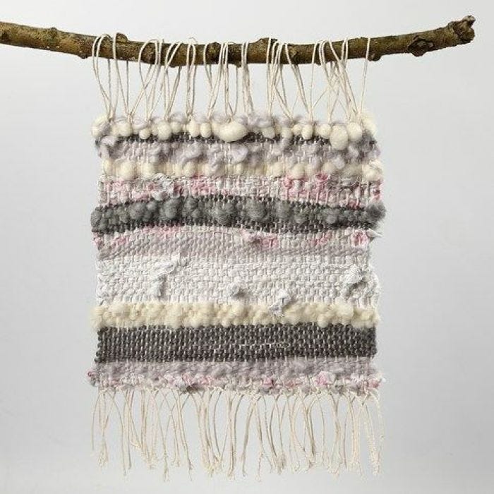 A woven Picture from Cotton Yarn, Wool and Strips of Fabric