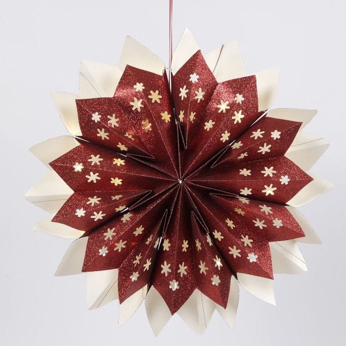 A Star made from glittery Paper Bags fitted with concealed battery-powered LED Lights