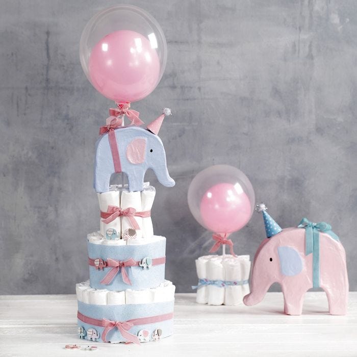 A tiered Nappy Cake with Elephants  and Balloons