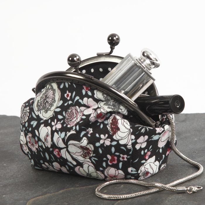 A Make-up Bag with a Metal Clasp made from Patchwork Fabric