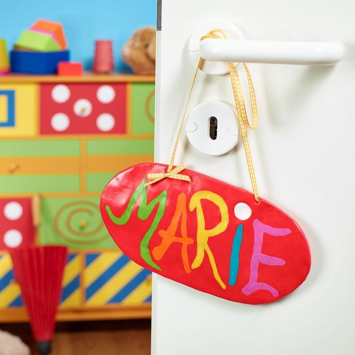 A hanging door sign made from Fimo modelling clay