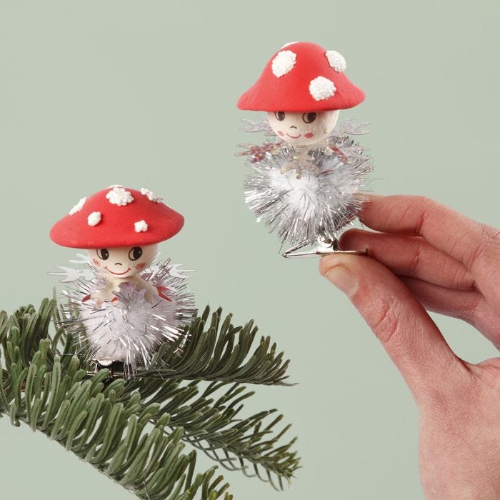 Toadstools with a glitter pom-pom body