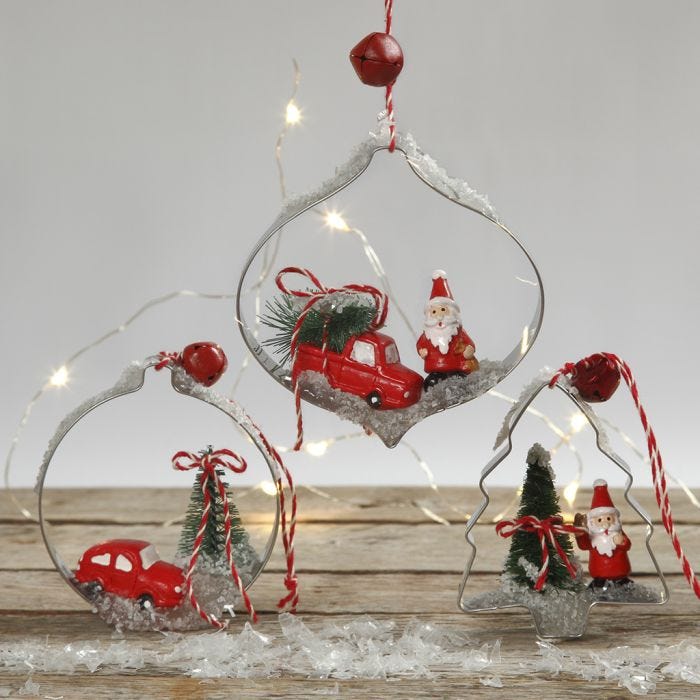 Christmas hanging decorations with miniature figures in shape cutters