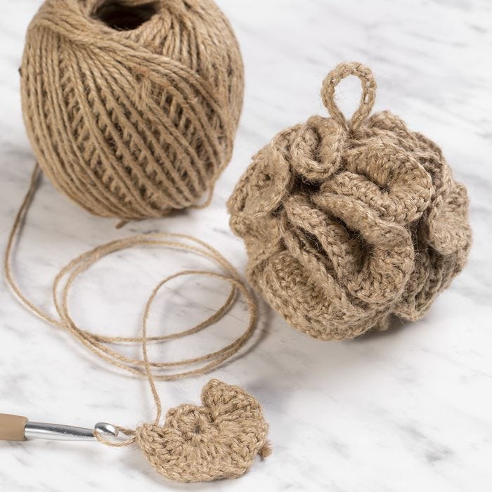 A crocheted bath sponge from natural twine