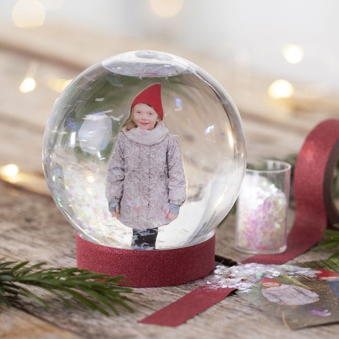 A snow globe with a photo