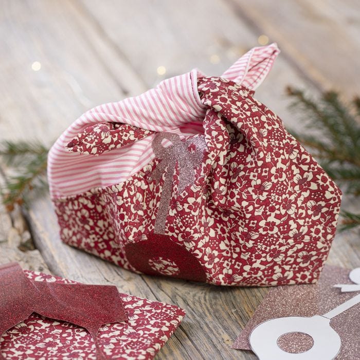 A recycled fabric bag with designs