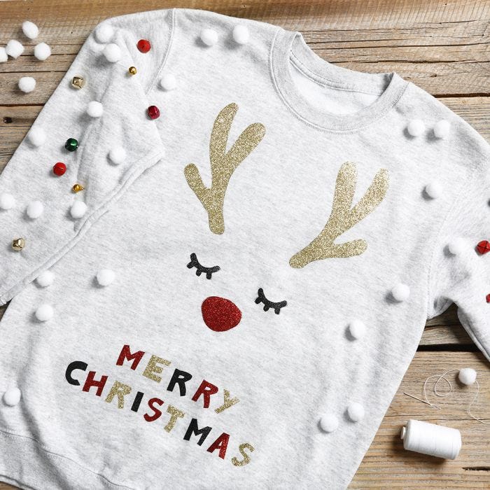 An amusing Christmas jumper with jingle bells