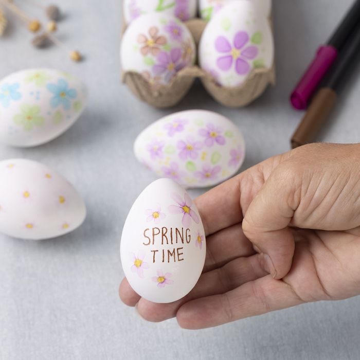 Watercolour flowers on plastic eggs