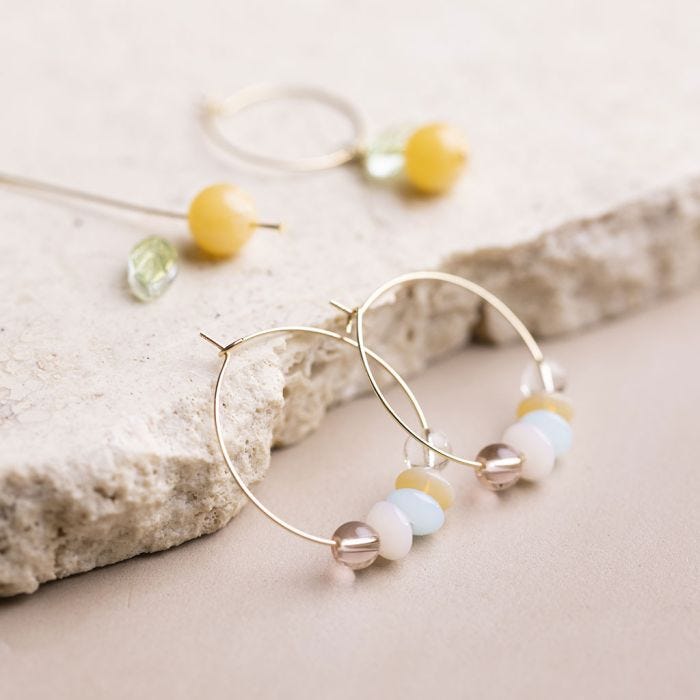 Beaded hoop earrings with glass beads