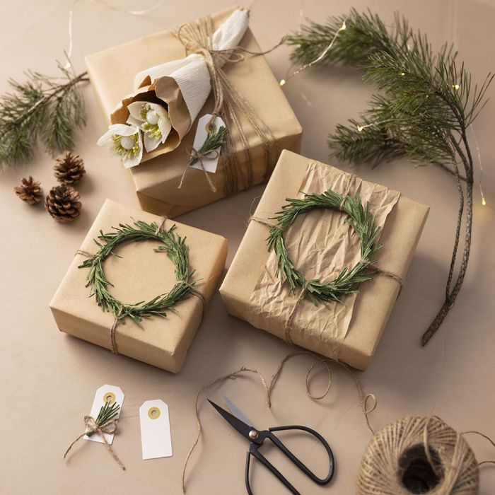Gifts with green crepe paper wreaths