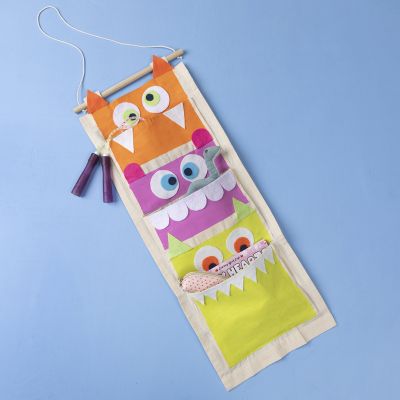 Hanging organiser with hungry monsters