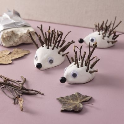 Hedgehogs made of clay and sticks