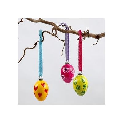 A painted Terracotta Egg with a Pattern drawn using a marker