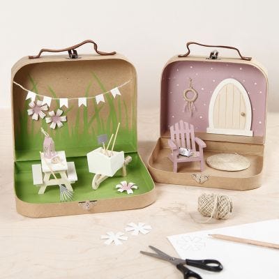 Small Suitcases transformed into a Garden World with Paint