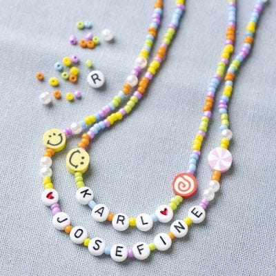 Beaded necklace with letters