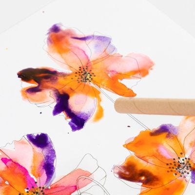 How to create effects with blowpipes in watercolor
