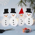 A Row of Card Snowmen decorated with Silk Clay