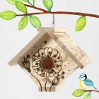 A bird box decorated with a pyrography tool