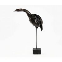 Sculptured bird on a stick