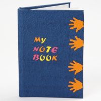 A Notebook with a punched-out Design