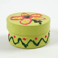 A painted round Box with a Lid, decorated with Glitter