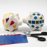 Designs and Letters on a Porcelain Piggy Bank