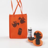 An orange Bag for Halloween decorated with stamped Designs