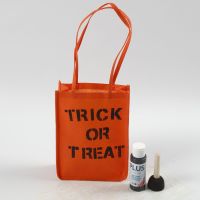 An orange Bag for Halloween decorated with Text