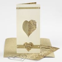 A tri-fold Card with Half a punched- out Heart using the Die-Cutting Machine