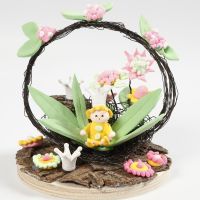 A Miniature World with a Fairy and Flowers
