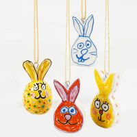 Porcelain Easter rabbits decorated with glass and porcelain markers