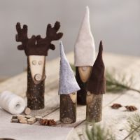 A nosy elf and a reindeer from wooden sticks