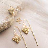 Dangle earrings with rocaille seed bead pendants