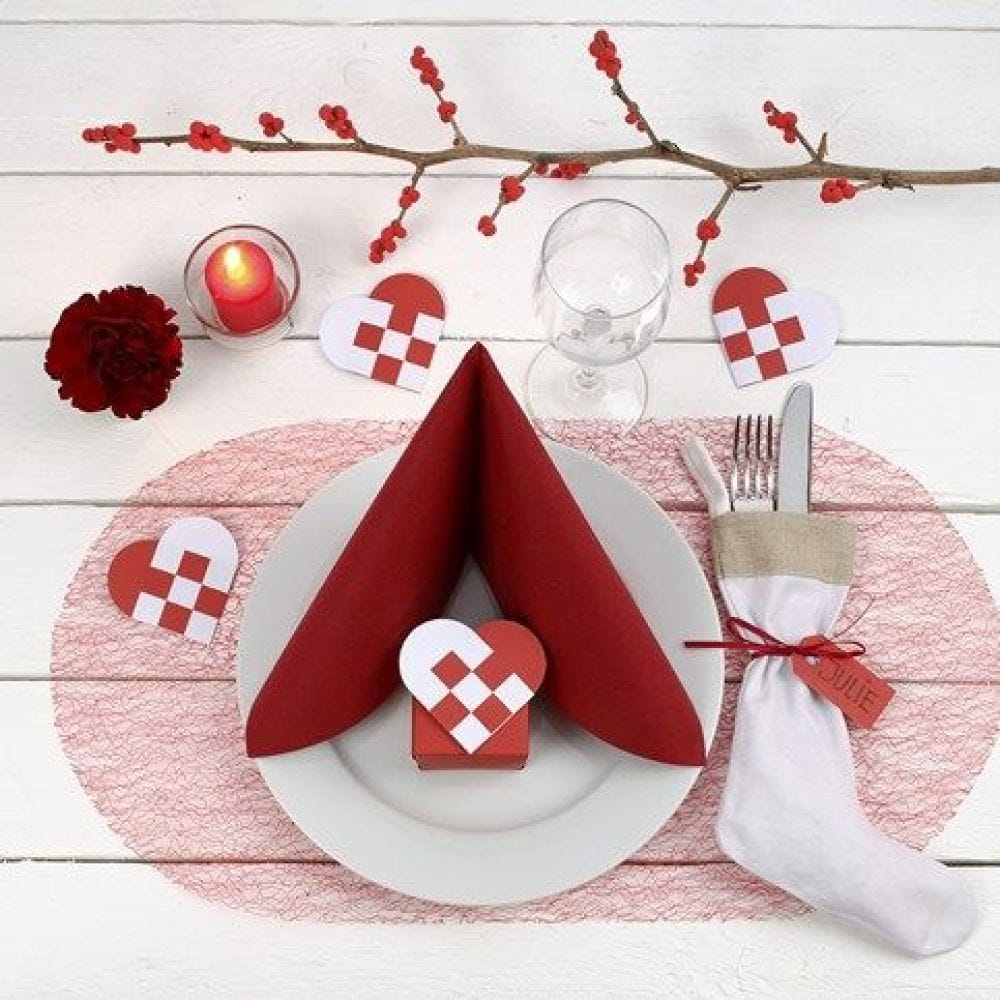 Decorating a red and white Christmas Table