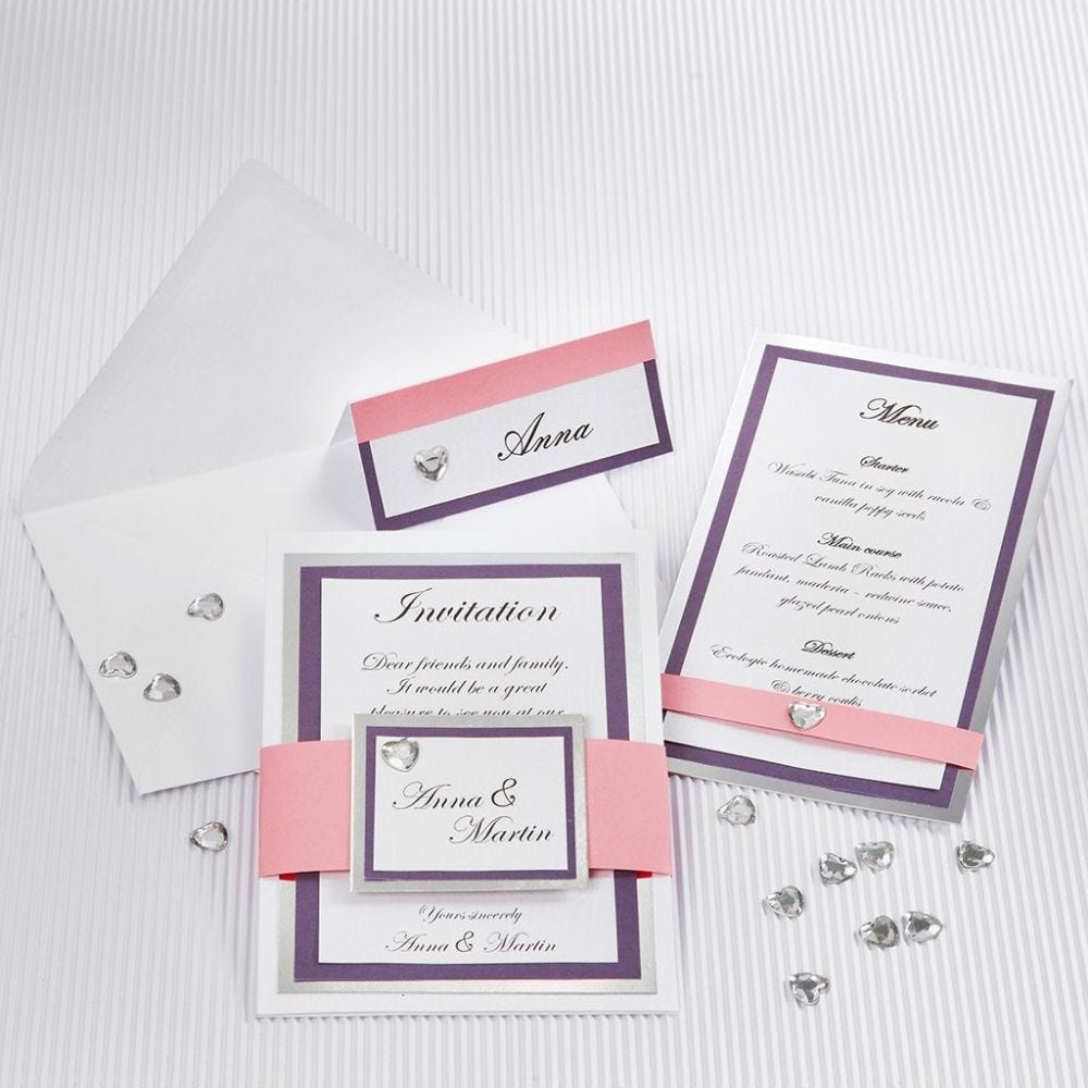 A Wedding Card with a silver Card Frame and textured Paper