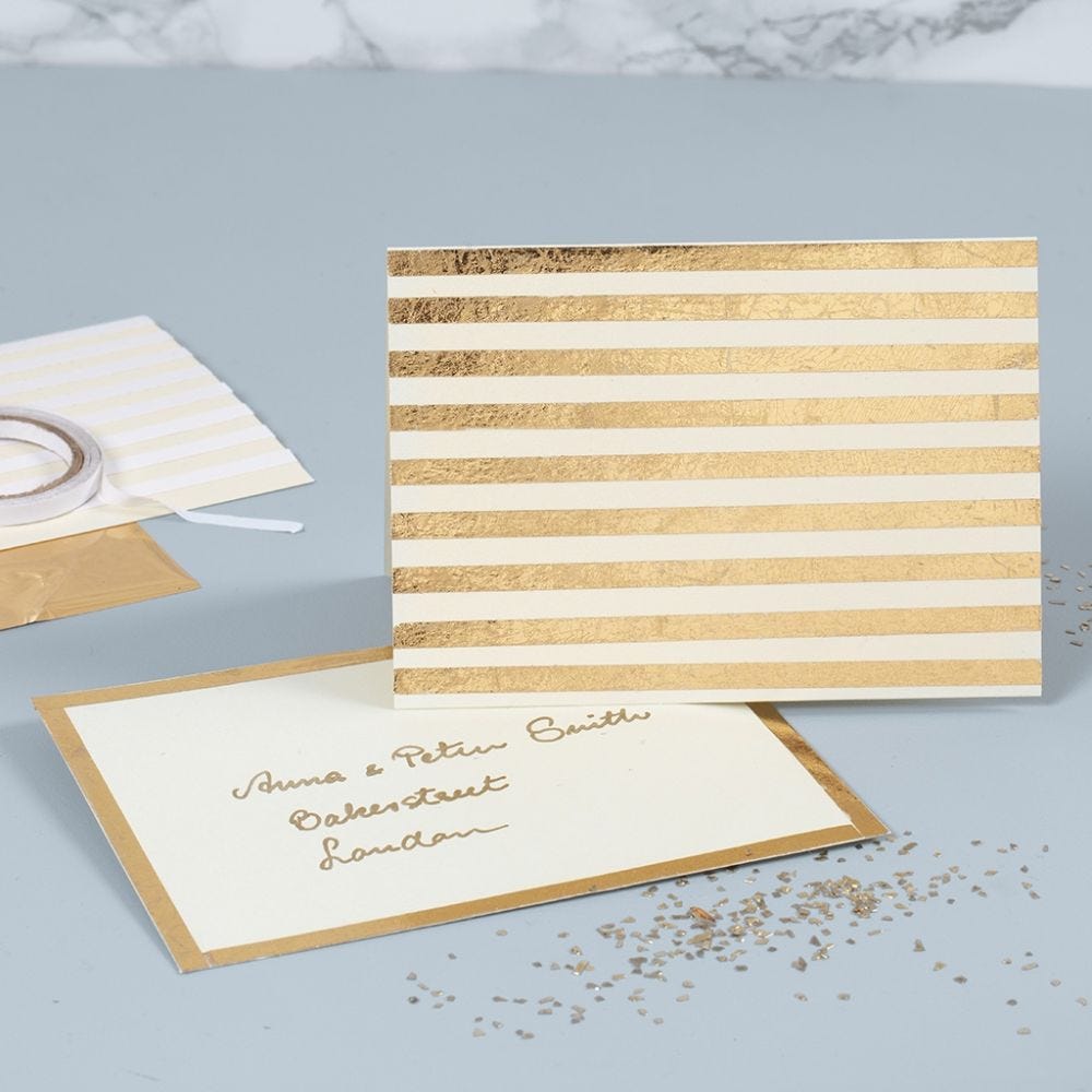 A pearlescent Greeting Card decorated with gold Deco Foil Stripes