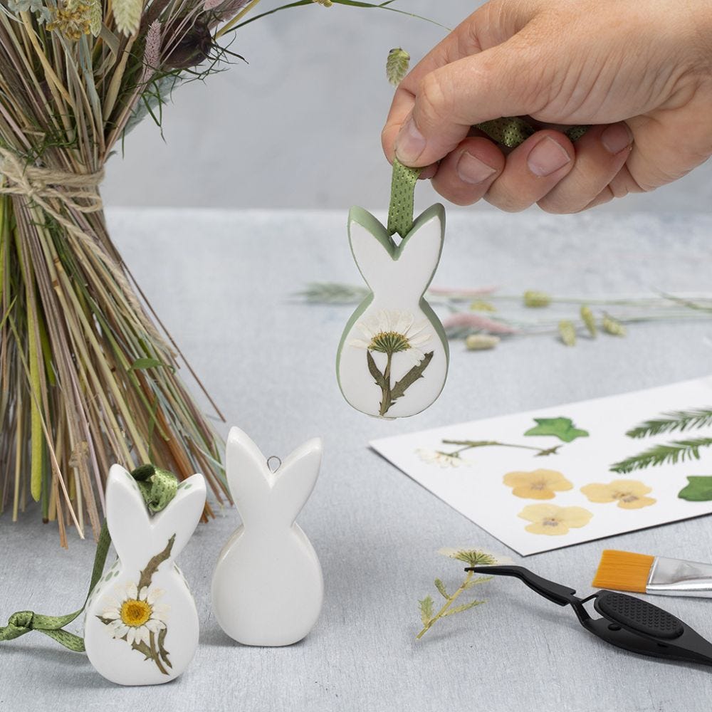 Easter hanging porcelain decorations with dried flowers