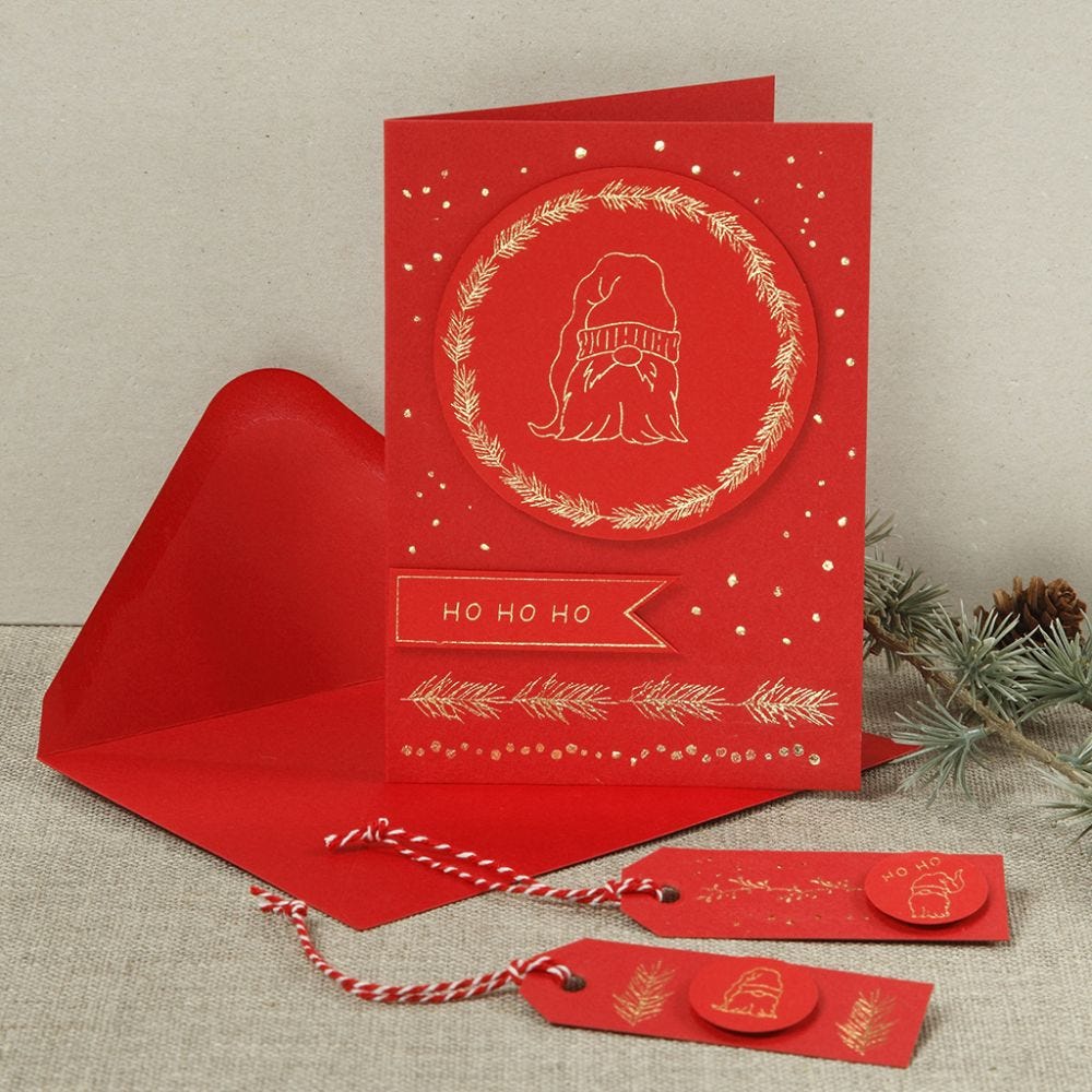A Christmas card with a nosy elf made from deco foil