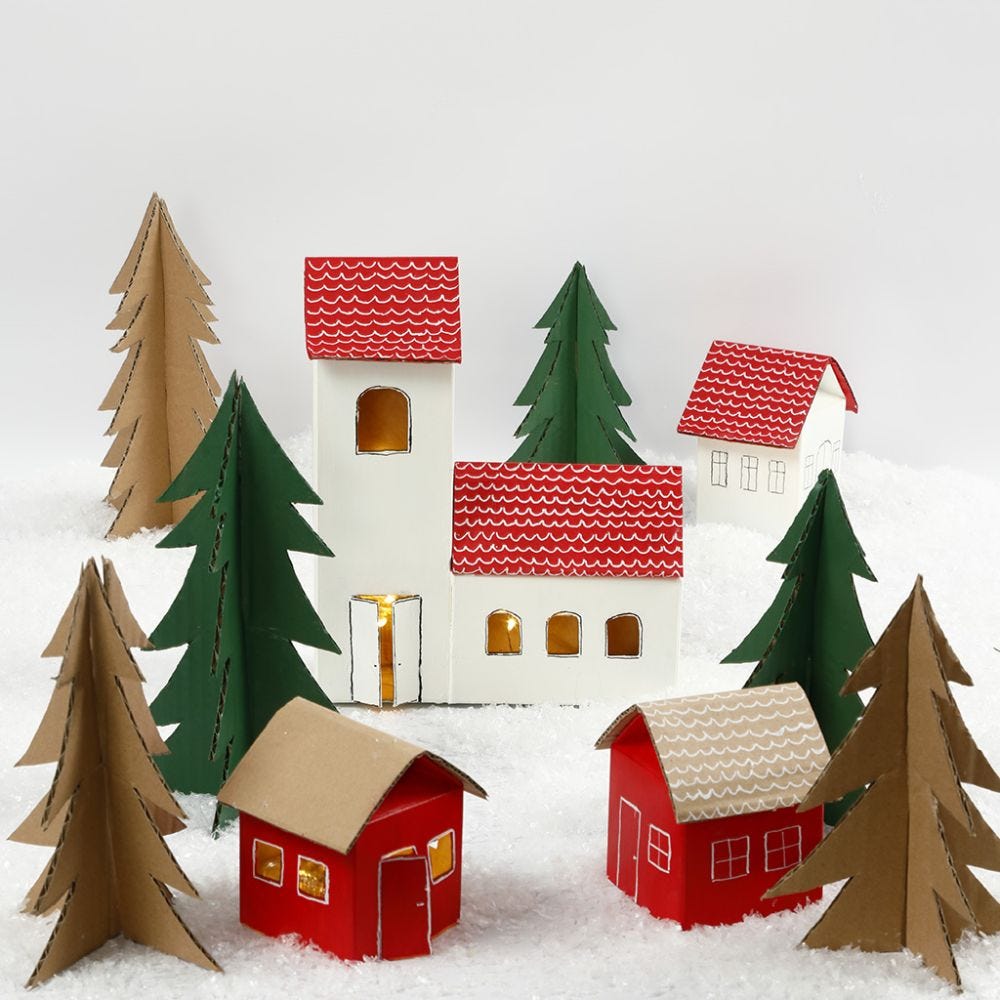 A Christmas village and Christmas trees from recycled cardboard