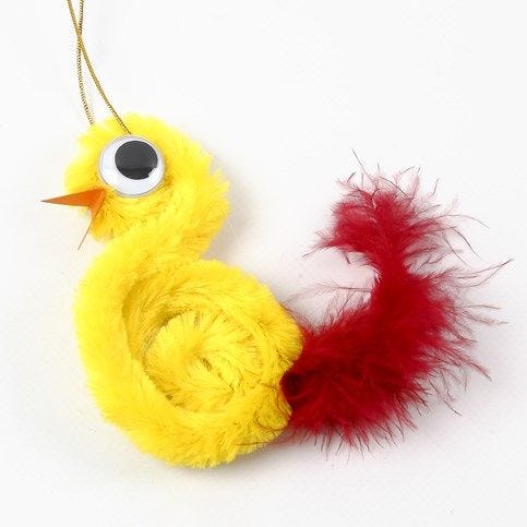 A Chick from a Pipe Cleaner and Feathers